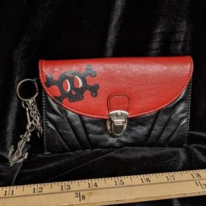 Skull wallet purse with charms.